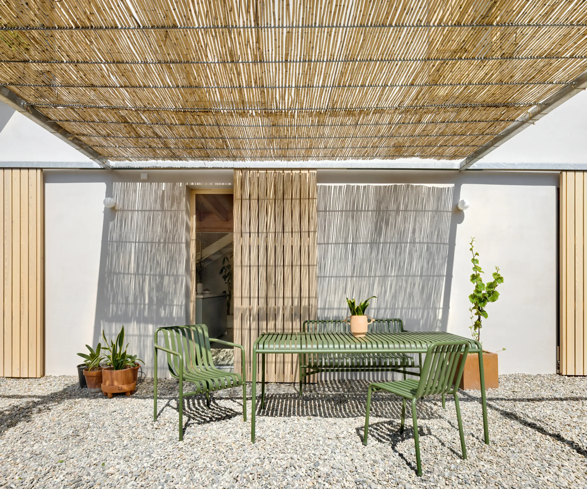 Kokudev Padilla Arquitectura Builds a Mountain House Around a Reed-Canopied Courtyard