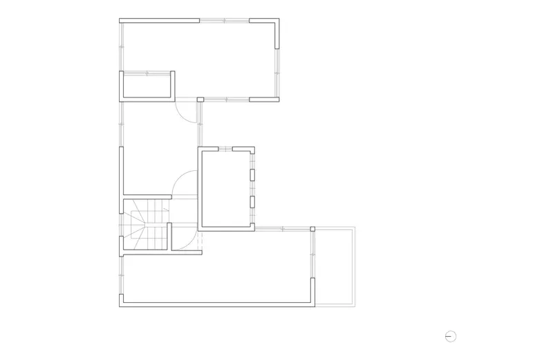 Floor plan drawing showing upper level with central stair and four room volumes