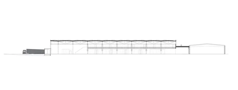 Longitudinal section drawing revealing the repetitive structural bays and a sloped volume at the left edge