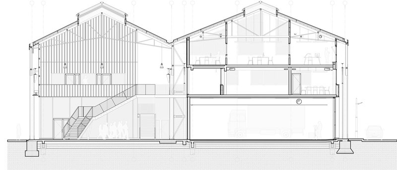 Section drawing revealing two gabled volumes with a central staircase and multilevel interior spaces