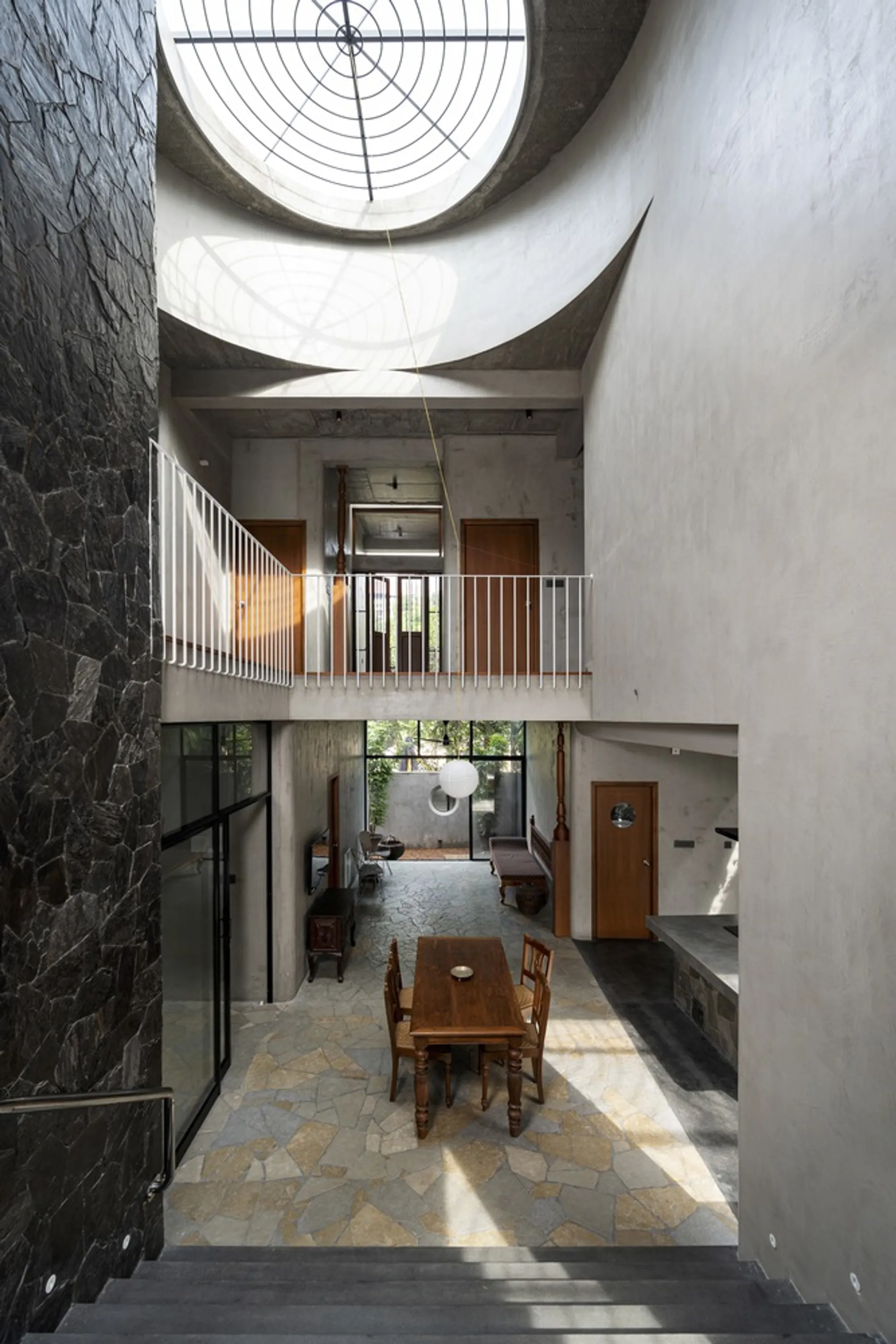 TAB Wraps a Geoffrey Bawa-Inspired Family Home in Ribbed Metal Cylinders in Kochi