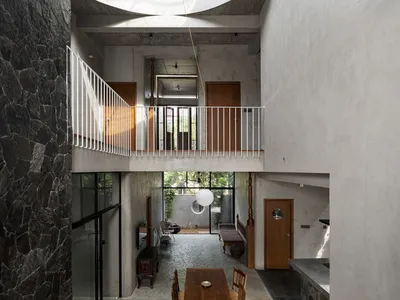 TAB Wraps a Geoffrey Bawa-Inspired Family Home in Ribbed Metal Cylinders in Kochi