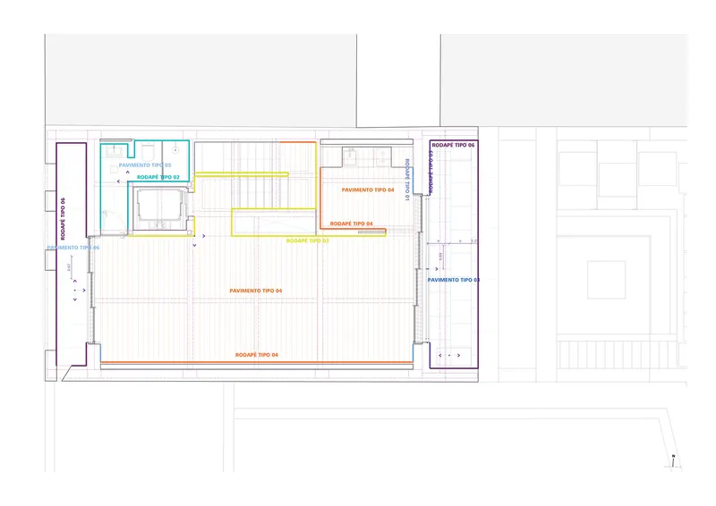Floor plan drawing indicating a large open space with staircase and smaller adjacent rooms in color