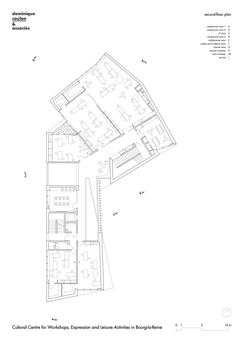 Second floor plan drawing showing workshop and studio spaces arranged within the angled building envelope