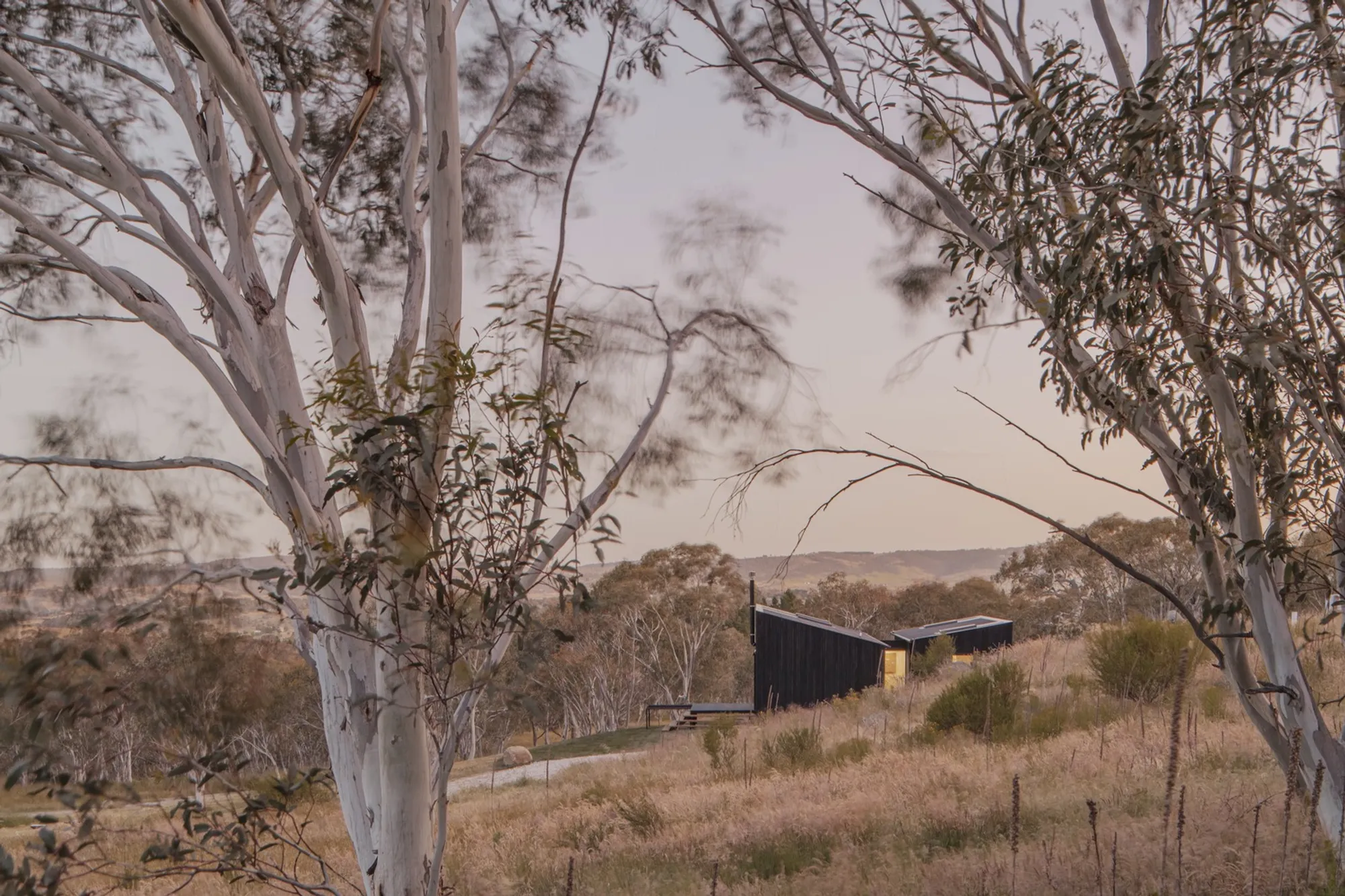 Alan Powell Studio Drops Two Charred Timber Pods into the Australian Alps