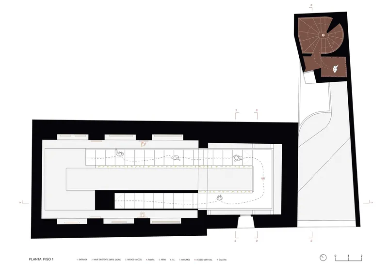 Floor plan showing the first level with a central linear volume and spiral stair in an angled tower