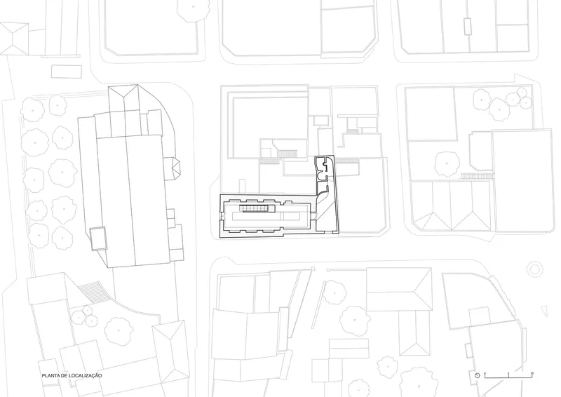 Site plan drawing showing the building footprint within the surrounding urban block and street layout