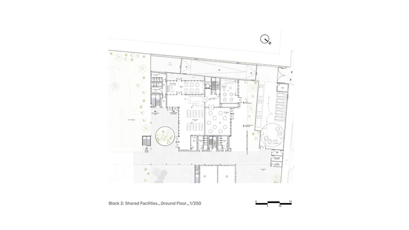 Ground floor plan showing shared facilities with circular courtyard and surrounding landscape areas