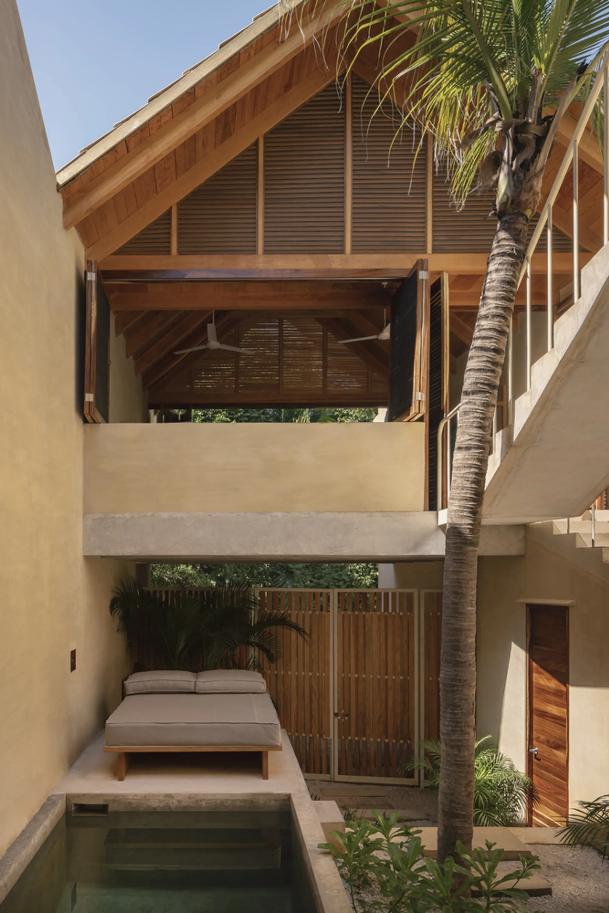 PRODUCTORA Splits Five Oaxacan Beach Houses into Staggered Volumes Linked by Zigzag Stairs
