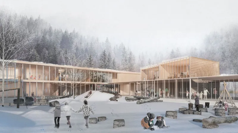 Courtyard view of the timber-framed school wings with children playing on scattered blocks in fresh snow