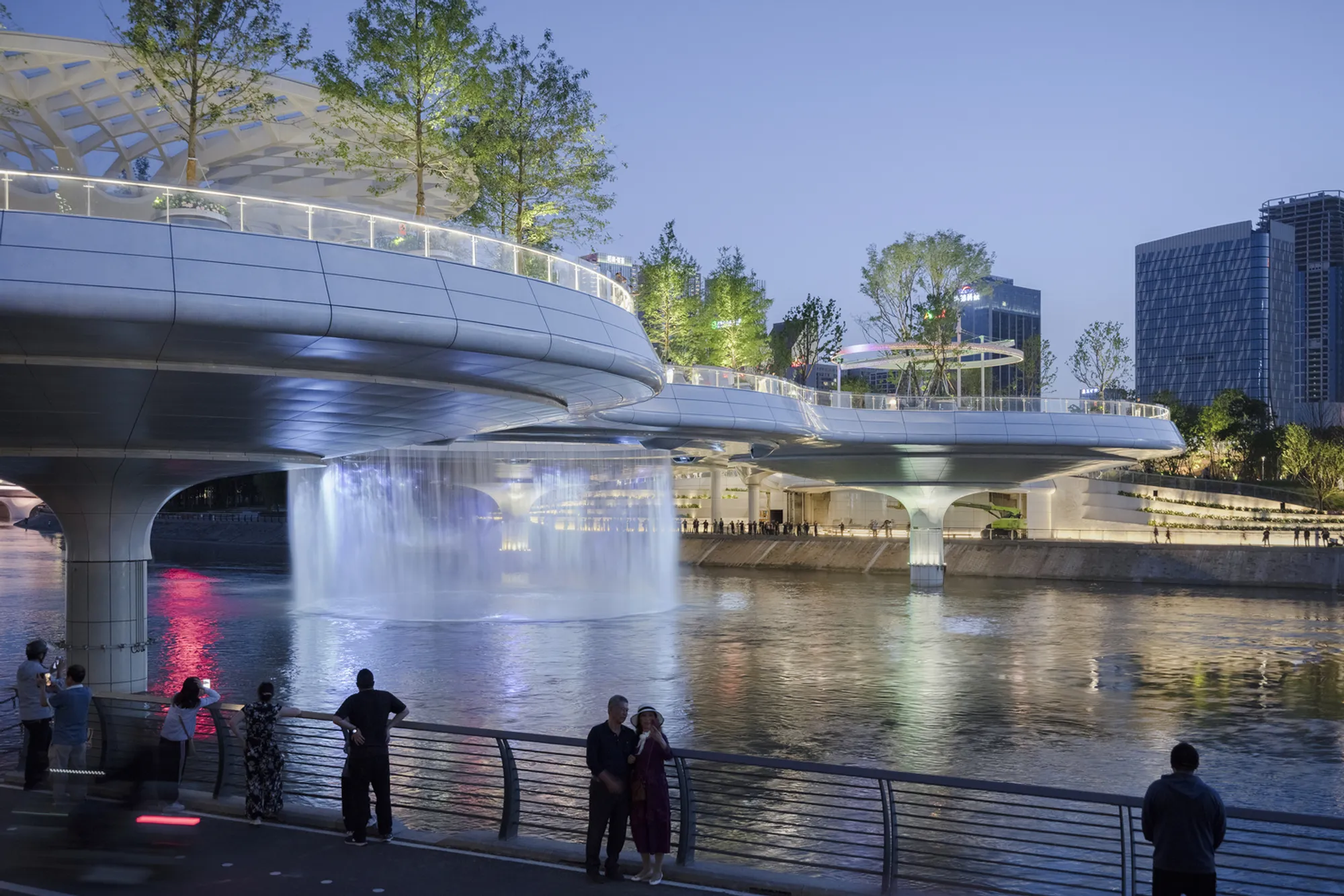 China Southwest Architectural Design Floats a 498-Meter Lotus-Leaf Park Over Chengdu's Jinjiang River