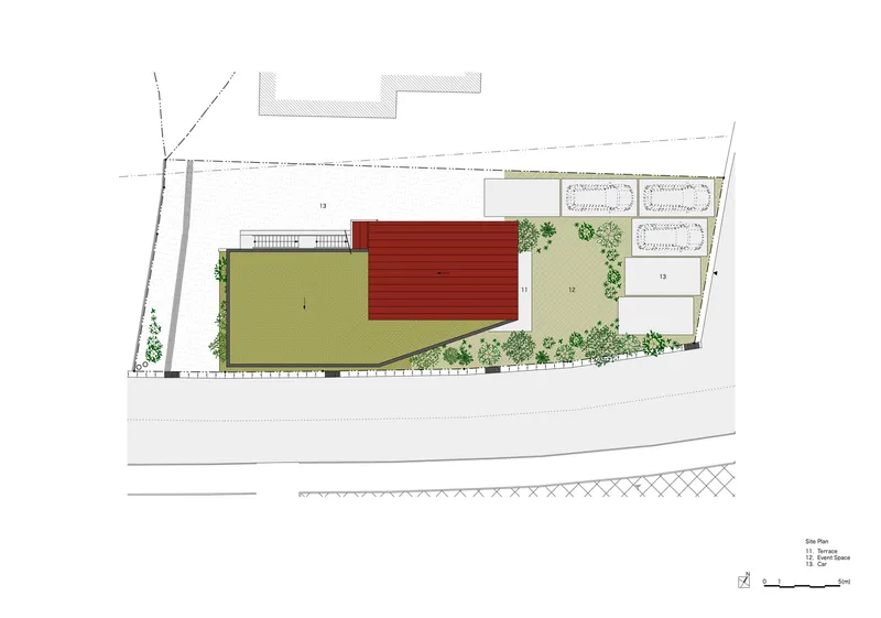 Site plan drawing showing three rectangular volumes with courtyard spaces and perimeter planting