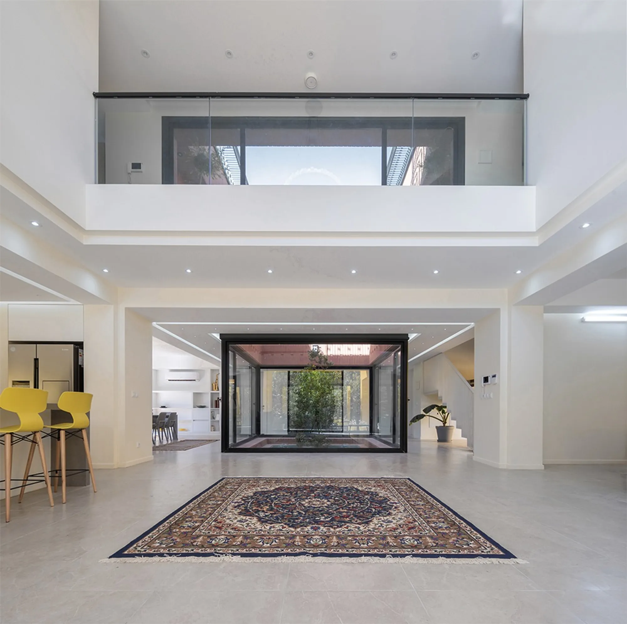 HAMAAN Studio Carves an Intermediary World into an Unfinished Iranian Villa
