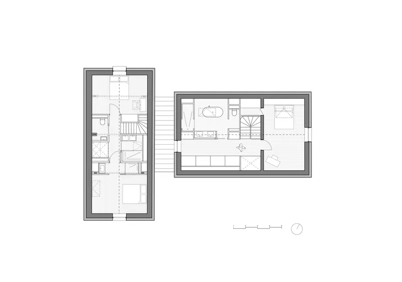 Upper floor plan showing two volumes linked by an exterior walkway with bedroom suites