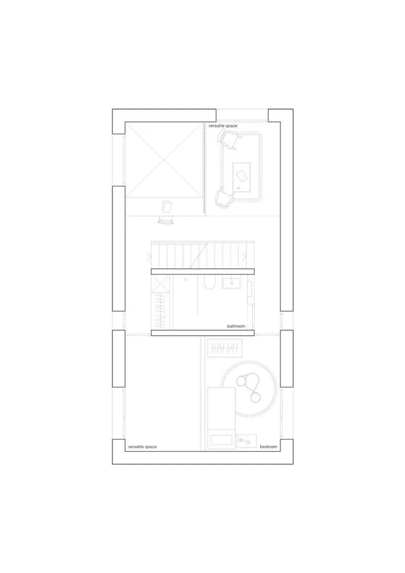 Upper floor plan drawing showing bedroom and bathroom spaces organized around a central stairwell