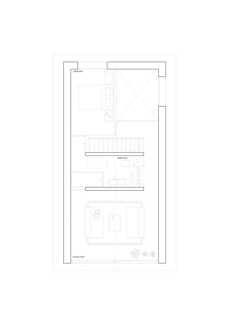Top floor plan drawing showing bedroom and living room spaces with a central stair and balcony