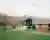 Lionel Ballmer Floats a Timber House Above a Swiss Orchard Like a Modern Raccard