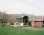Lionel Ballmer Floats a Timber House Above a Swiss Orchard Like a Modern Raccard