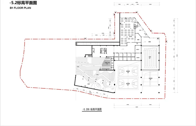Floor plan drawing showing a level with basketball courts, stepped seating area, and irregular footprint