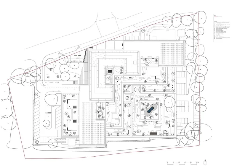 Site plan drawing showing building footprints, courtyards and surrounding tree canopy