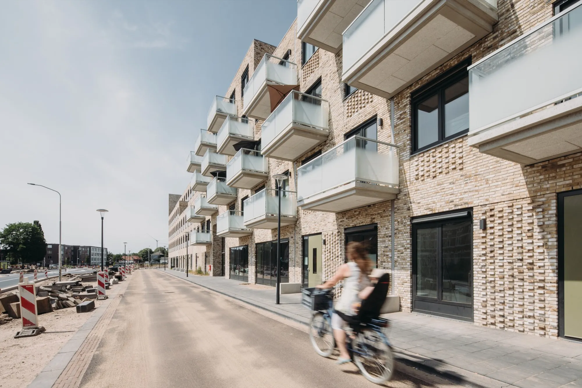 Thijs Asselbergs Packs 324 Apartments into a Harborfront Brick Ensemble in Nijmegen