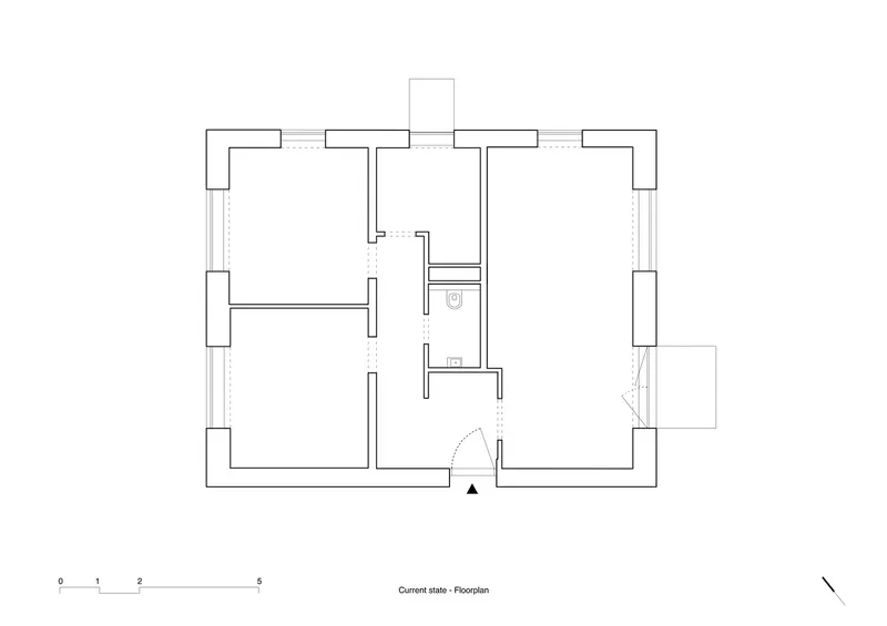 Floor plan drawing showing the original layout with a central bathroom and surrounding rooms