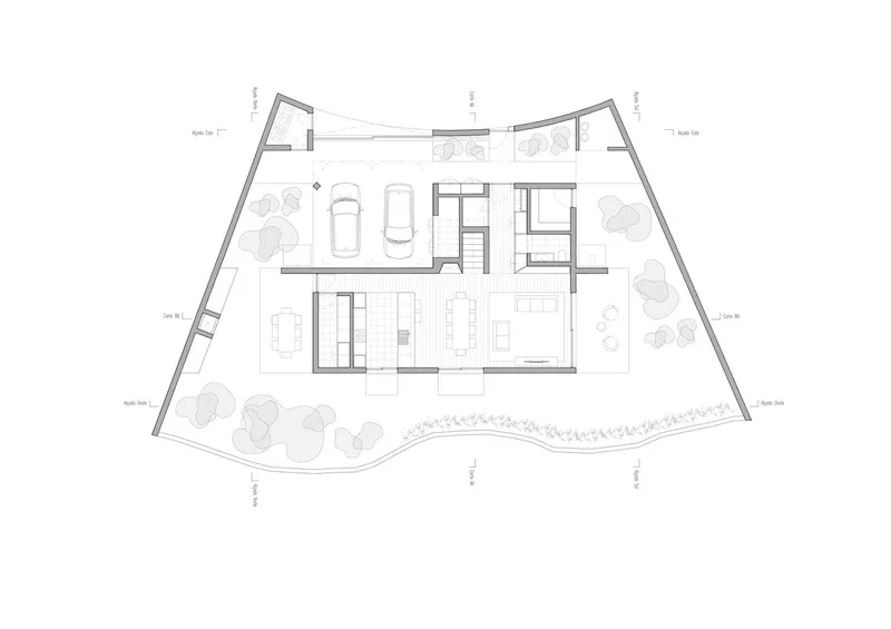 Floor plan drawing showing trapezoidal site with garage, living spaces, and landscape planting along perimeter edges