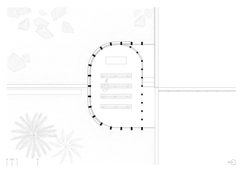 Plan drawing showing an oval volume with interior seating rows adjacent to palm trees and landscaping