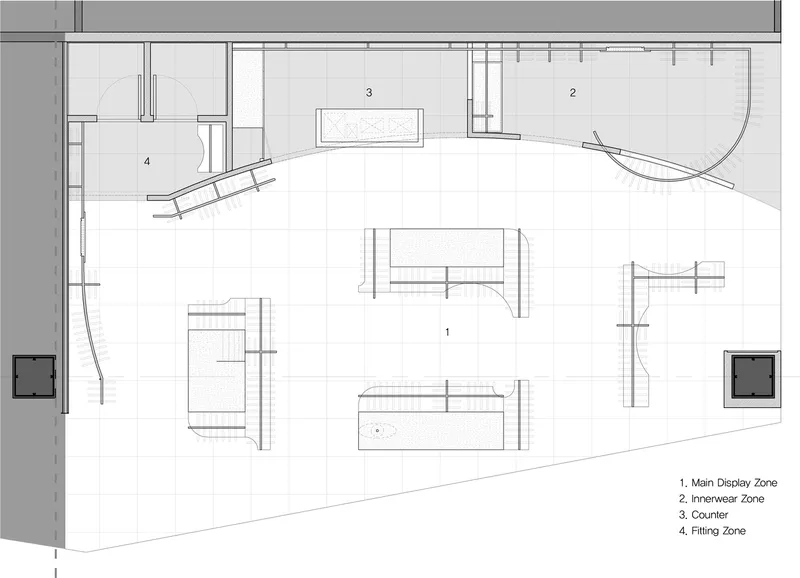 Floor plan drawing showing retail zones with central display area and curved innerwear section