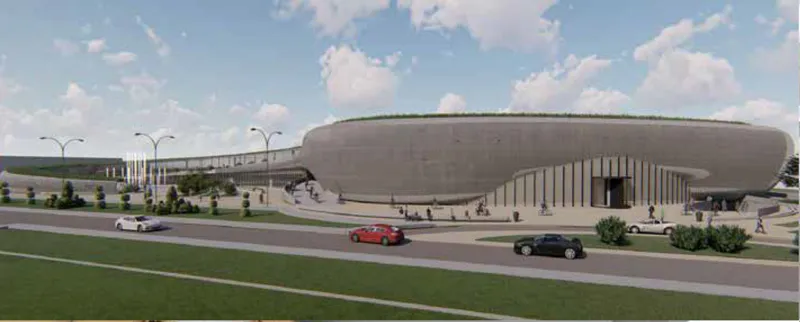 Exterior rendering showing the oval volume with vertical colonnade and green roof under cloudy skies