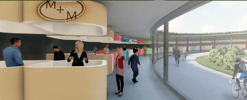 Reception area with curved counter and glazed corridor overlooking the exterior bike path