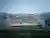 UAD Lifts a Football Pitch into the Sky to Shelter an Entire Sports Complex Beneath It