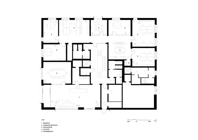 Floor plan drawing showing office rooms and meeting spaces arranged around a central stair