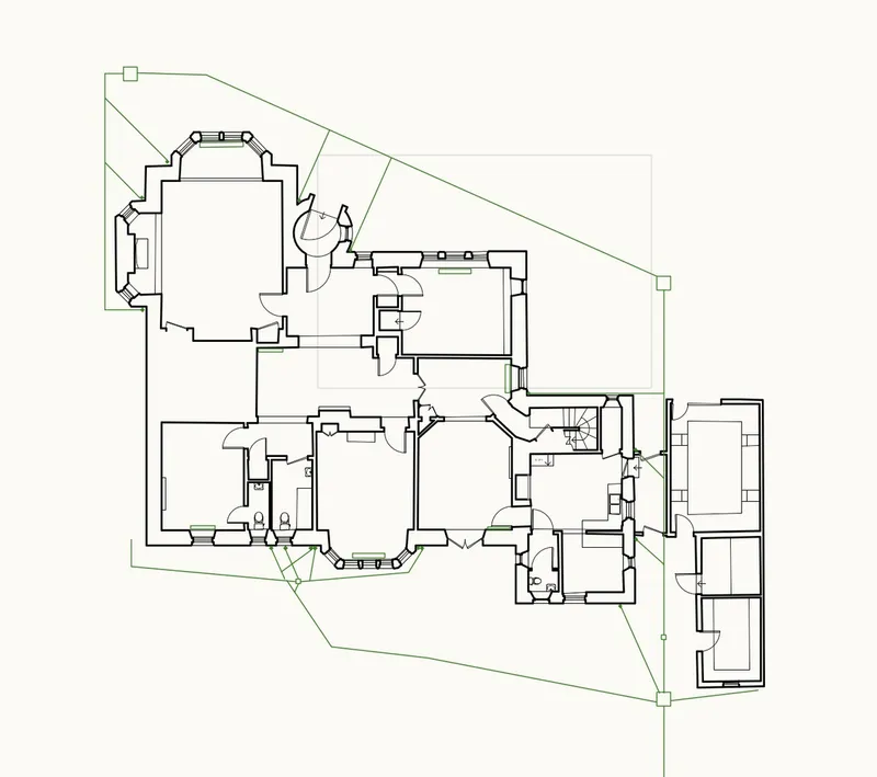 Floor plan drawing showing rooms arranged around central circulation core on sloped site