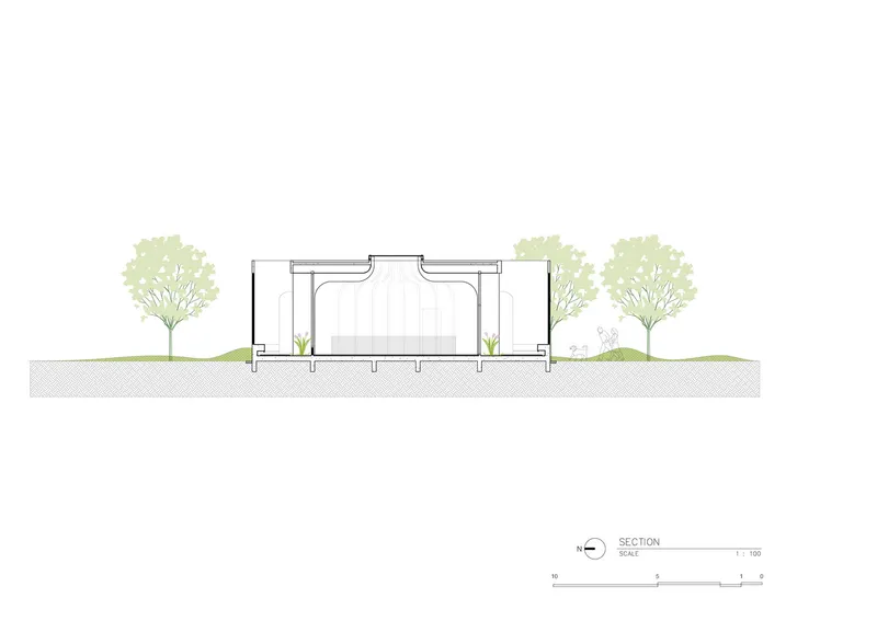 Section drawing revealing interior courtyard with curved ceiling vaults and central planted area