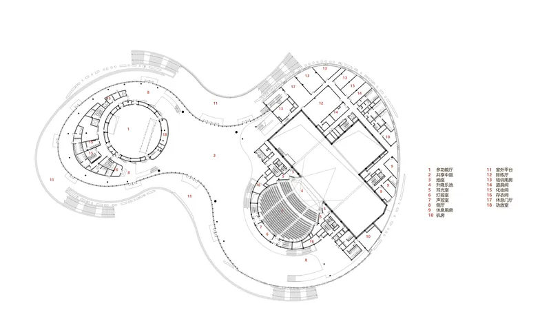 Floor plan drawing showing three interconnected lobed volumes with circular and rectilinear spaces