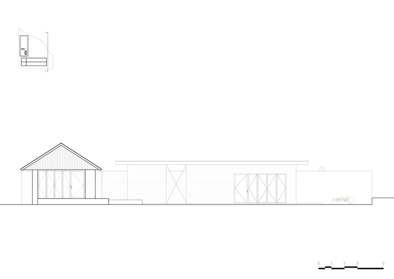 Elevation drawing showing a gabled volume connected to a flat-roofed wing with vertical cladding