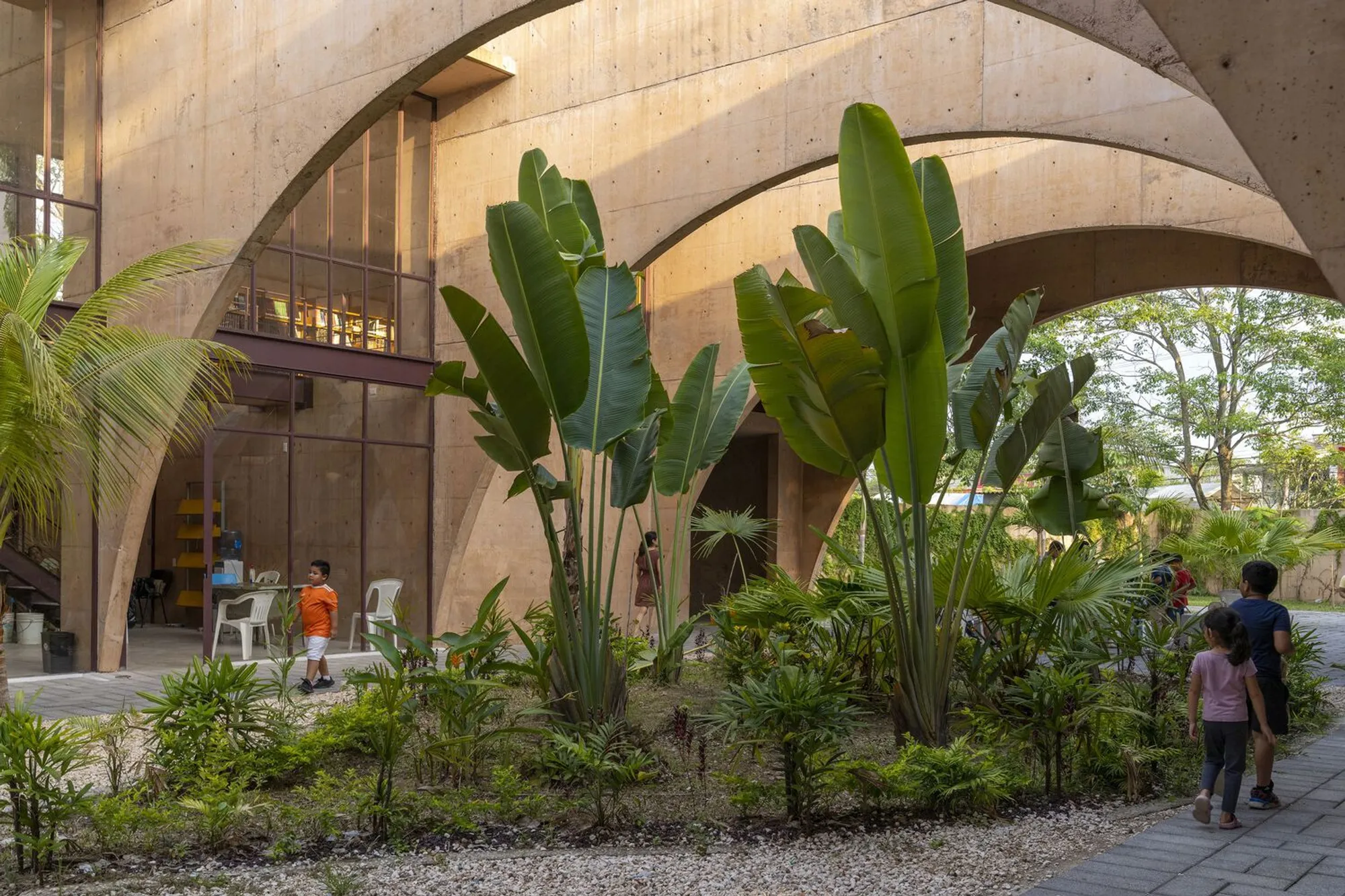 CCA Builds a Habitable Sculpture of Orange Concrete Arches for a Tabasco Community Center