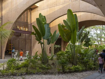 CCA Builds a Habitable Sculpture of Orange Concrete Arches for a Tabasco Community Center