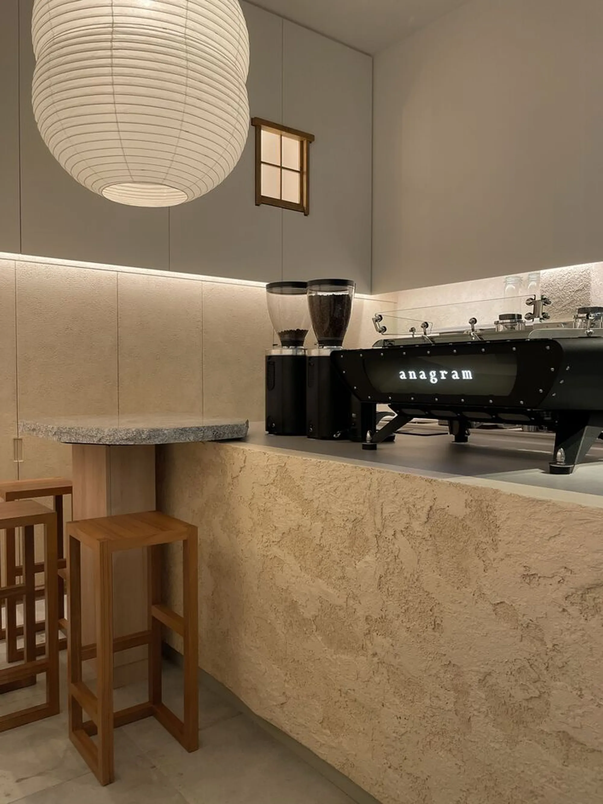Tristan & Ju Turns a 350-Square-Foot Nook into a Theatrical Coffee Stage in Singapore