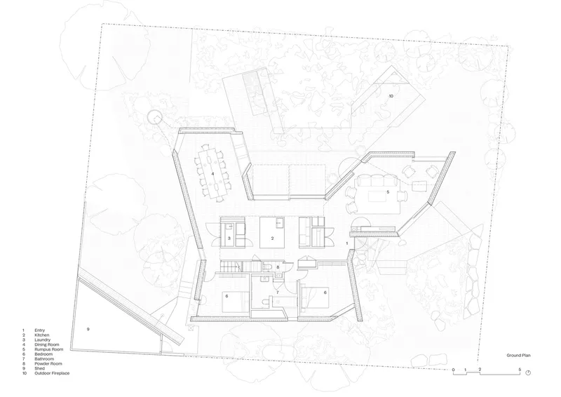 Ground floor plan drawing showing angular volumes around a central courtyard with surrounding landscape