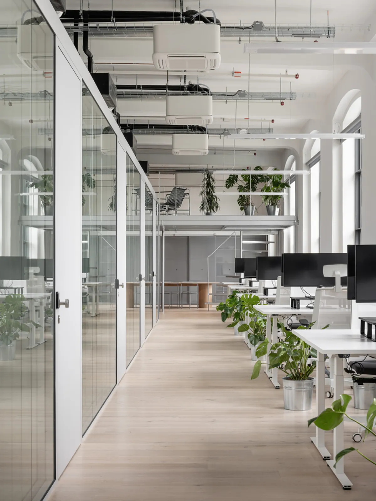 Kuklica Smerek Architekti Inserts an Office-Machine into a 1900 Bratislava Thread Factory