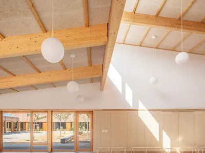 Richter Architectes Builds a Timber Village School Around Double Courtyards in Mitry-Mory
