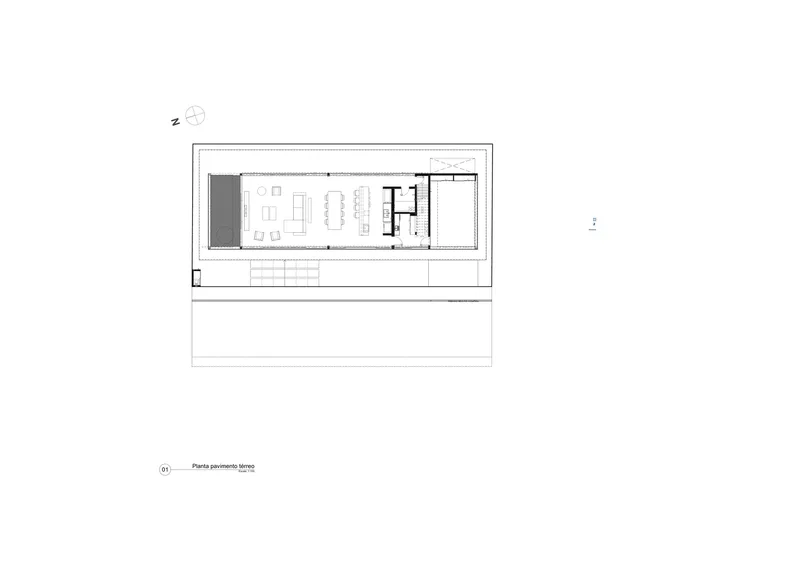 Ground floor plan drawing showing a linear layout with open living area and service core