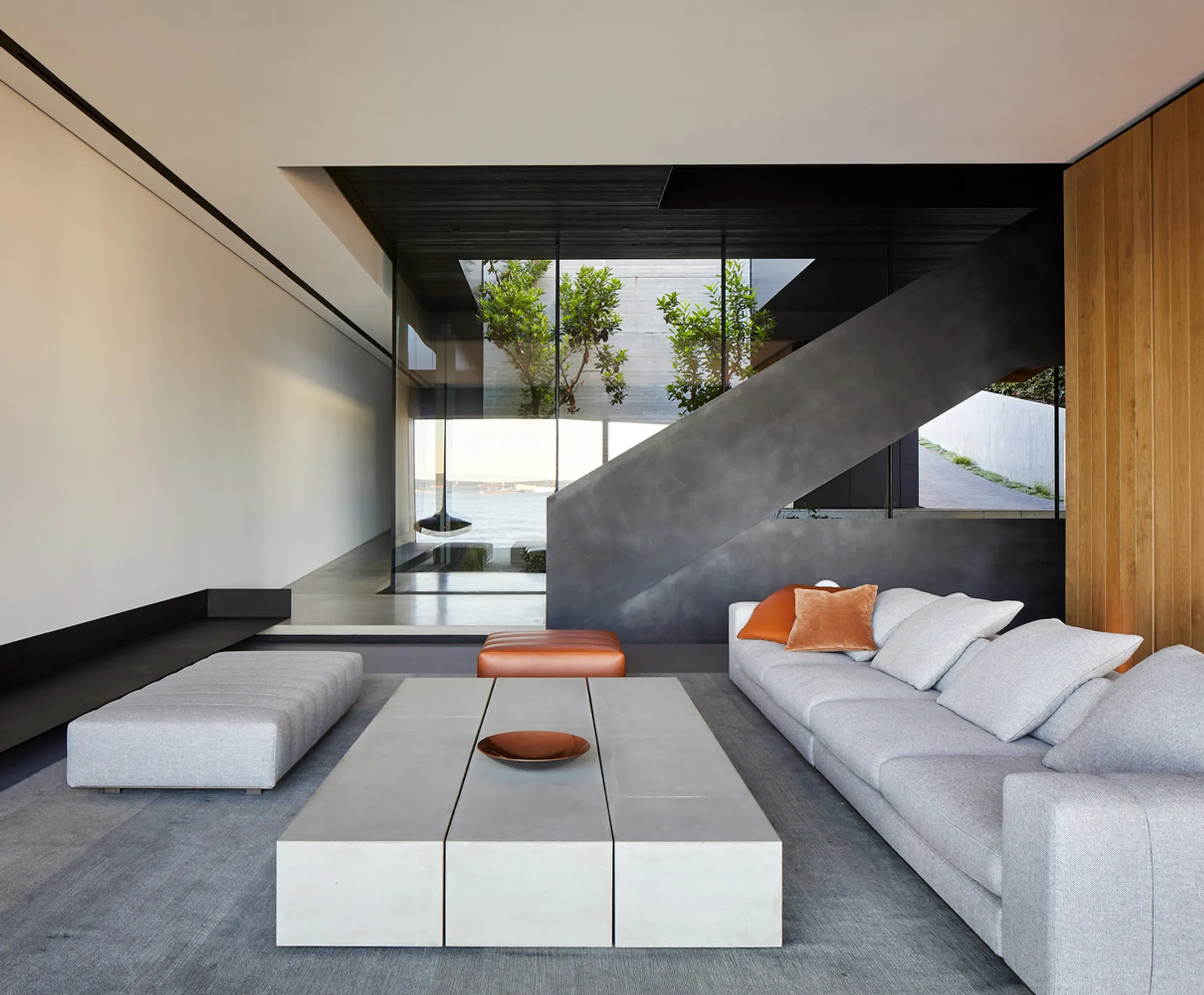 McLeod Bovell Cantilevers a Concrete House over West Vancouver's Rocky Seashore