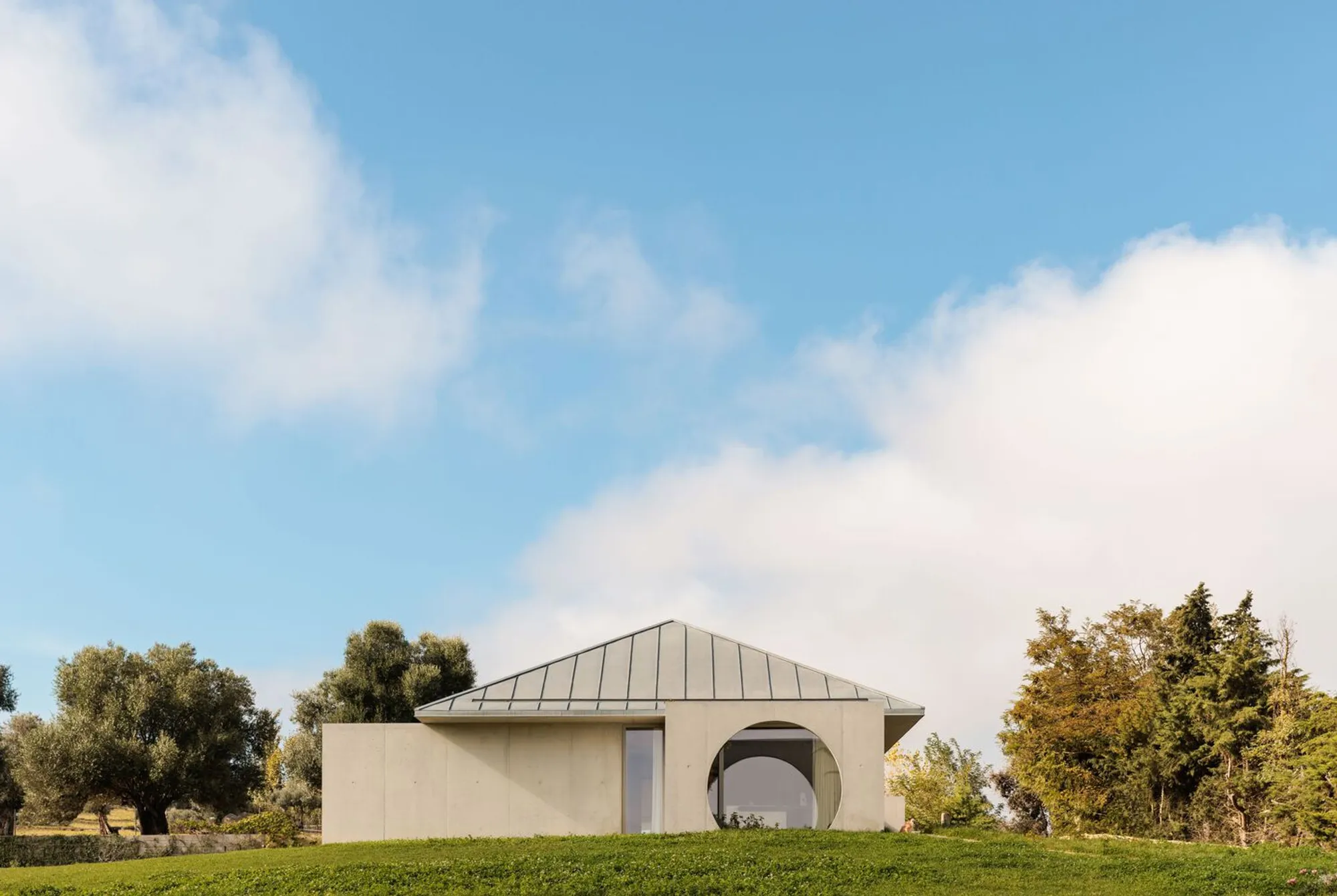 Cimbre Rebuilds a Ruin in Portugal's Arrábida Natural Park as a Concrete Country House