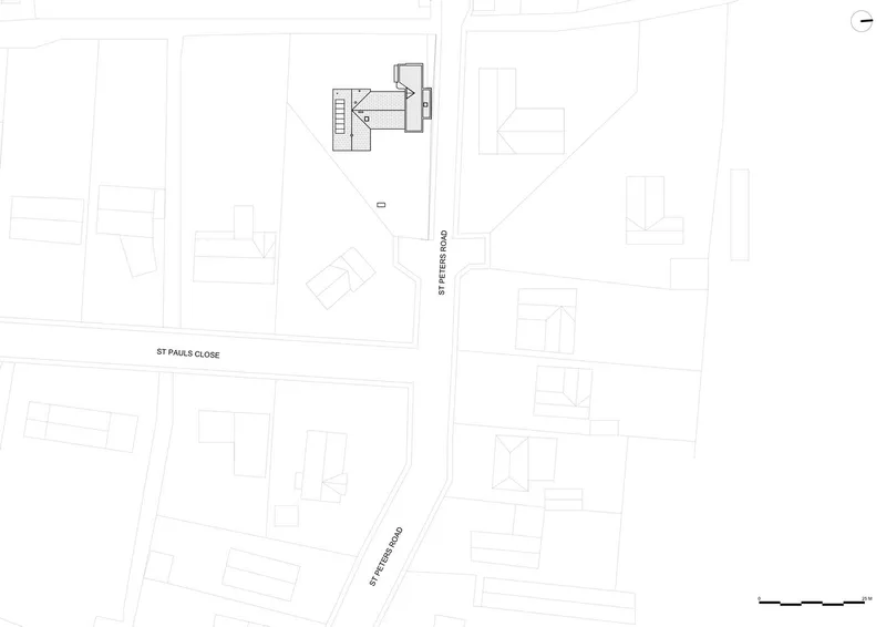 Site plan drawing showing building footprint and surrounding property boundaries on two streets