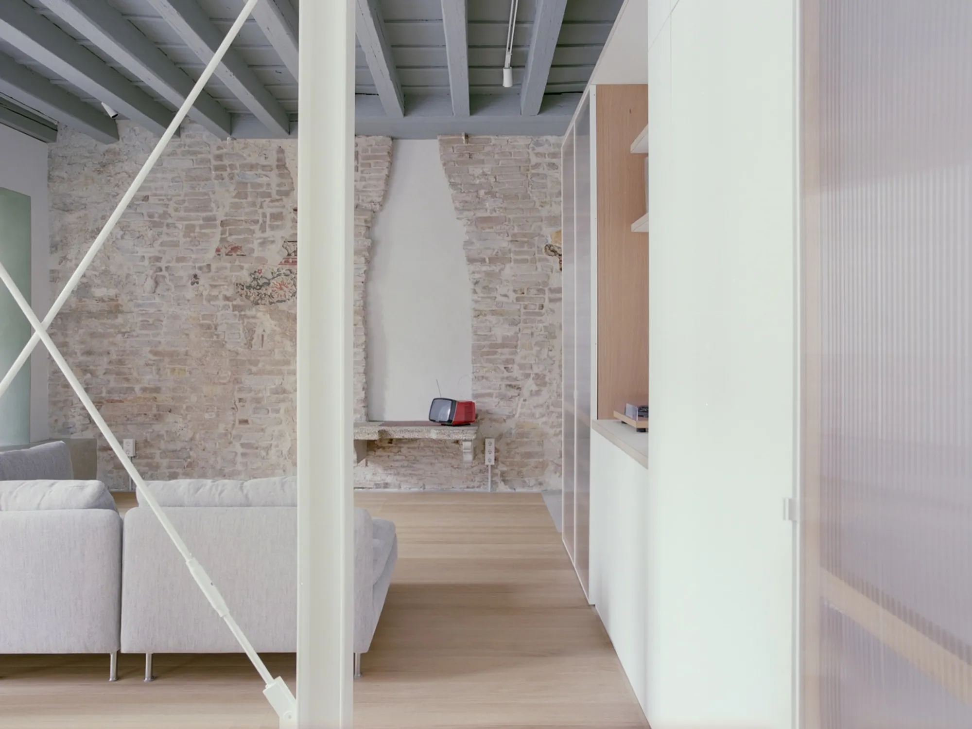 Vianello Gasparin Peels Back Five Centuries of Plaster in a Padua Apartment on Via del Santo
