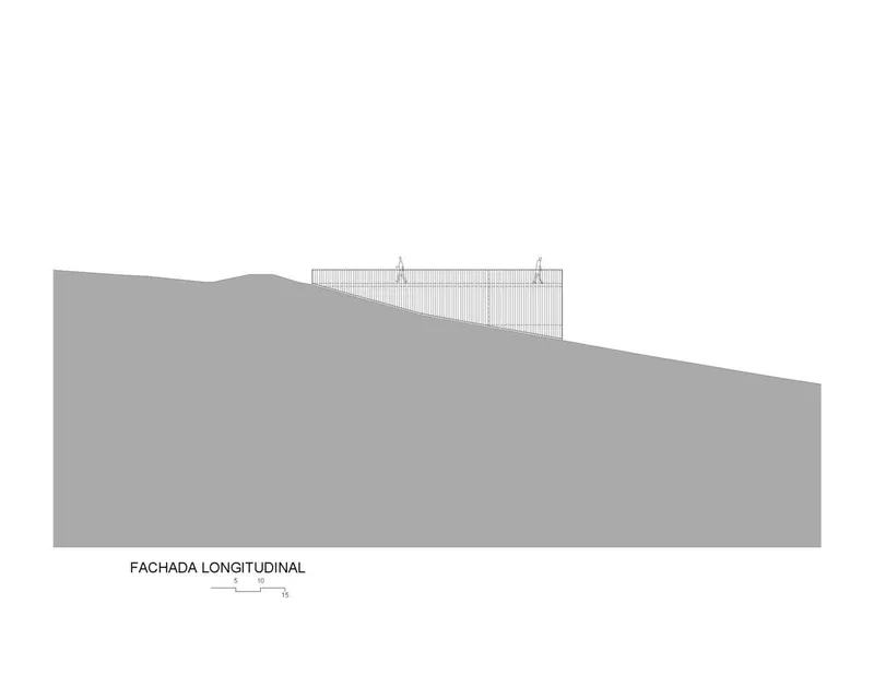 Longitudinal elevation drawing showing the slatted facade emerging from sloped terrain