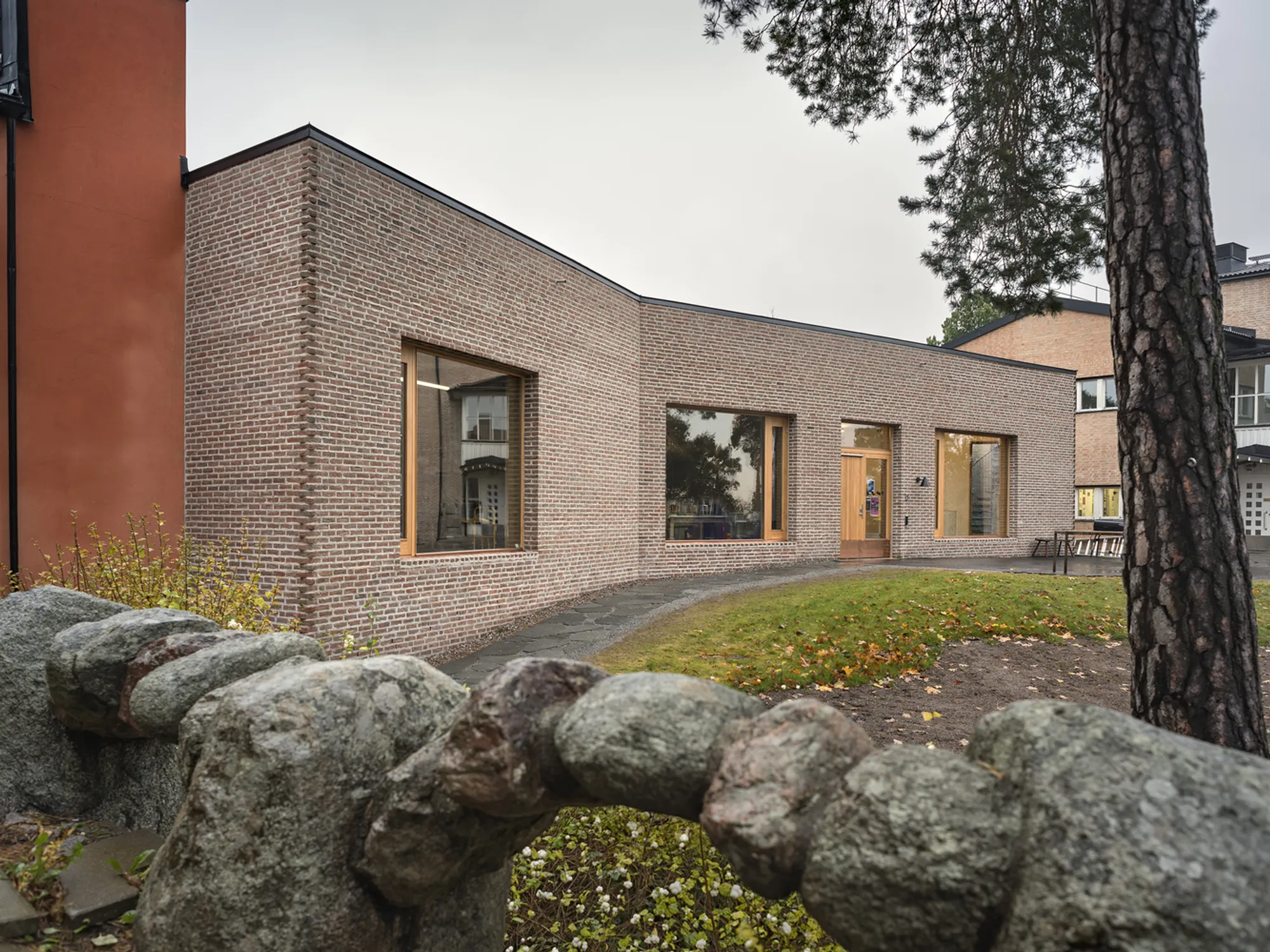 Marge Arkitekter Wedges a Brick Monolith Between Two Buildings at a Stockholm Art School